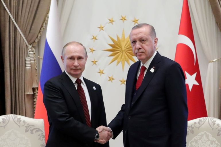 Turkish President Tayyip Erdogan and his Russian counterpart Vladimir Putin shake hands during a meeting in Ankara, Turkey April 3, 2018. Sputnik/Mikhail Klimentyev/Kremlin via REUTERS ATTENTION EDITORS - THIS IMAGE WAS PROVIDED BY A THIRD PARTY.