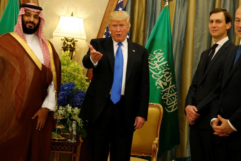 U.S. President Donald Trump, flanked by White House senior advisor Jared Kushner (2nd R) and chief economic advisor Gary Cohn (R), delivers remarks to reporters after meeting with Saudi Ara