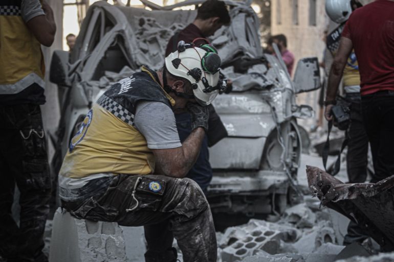 Airstrikes continue to hit Syria's Idlib- - IDLIB, SYRIA - AUGUST 16: White Helmets conduct search and rescue operation after Assad Regime and Russia carried out airstrikes over Arihah district of Idlib, Syria on August 16, 2019. Many dead and injuries were reported.