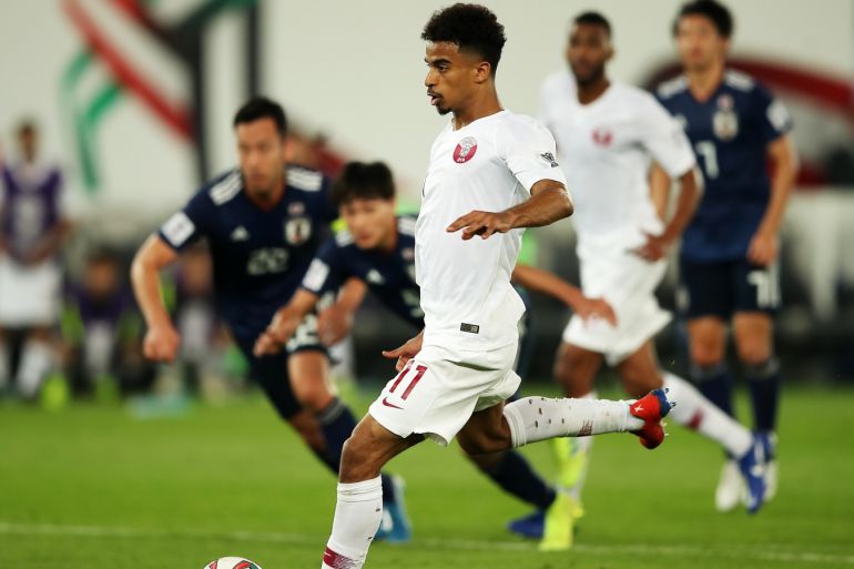 Japan v Qatar - AFC Asian Cup Final- - ABU DHABI, UAE - FEBRUARY 01: Akram Afif (11) of Qatar in action during the 2019 AFC Asian Cup final match between Japan and Qatar in Abu Dhabi, United Arab Emirates, February 01, 2019.