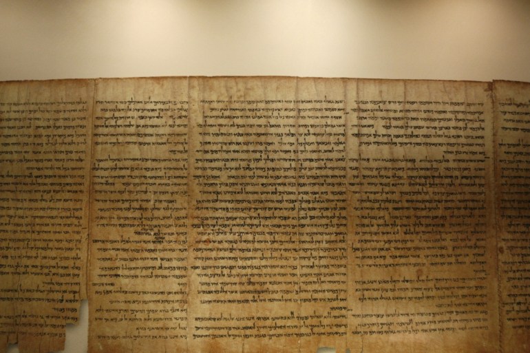 A facsimile of the Isaiah Scroll one of the Dead Sea Scrolls, is displayed inside the Shrine of the Book at the Israel Museum in Jerusalem.