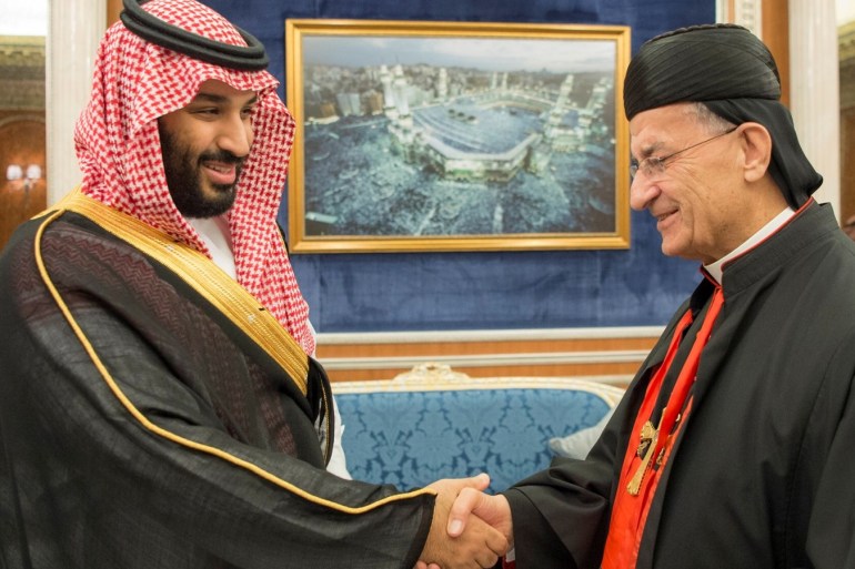 Saudi Crown Prince Mohammed bin Salman shakes hands with Lebanese Maronite Patriarch Bechara Boutros Al-Rahi during their meeting in Riyadh