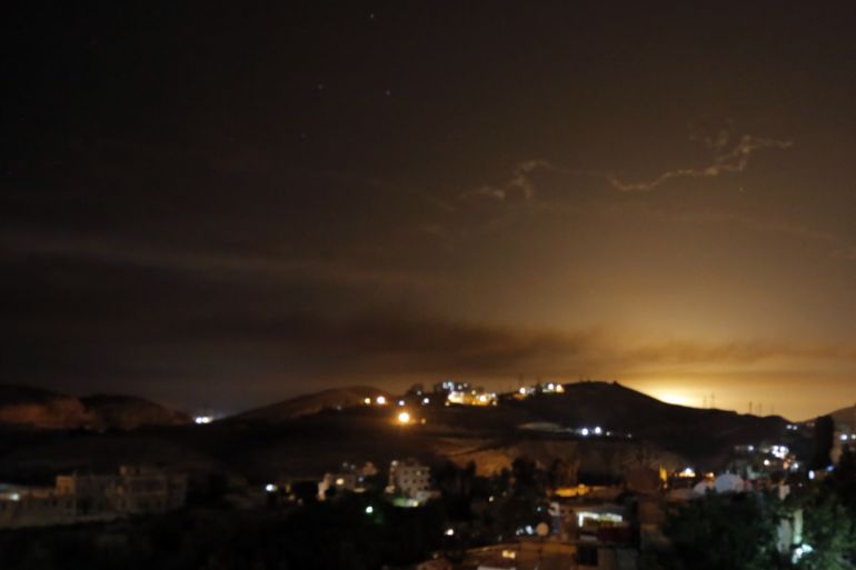 Syrian air defense missiles are seen in the sky over Damascus, 10 May 2018, responding to a new wave of Israeli missile strikes.