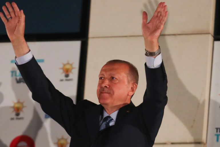 Turkish President Tayyip Erdogan greets his supporters gathered in front of the AKP headquarters in Ankara, Turkey June 25, 2018. REUTERS/Umit Bektas
