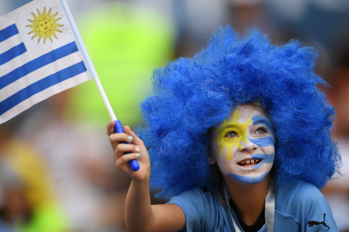 ROSTOV-ON-DON, RUSSIA - JUNE 20: A Uruguay fan enjoys the pre match atmosphere prior to the 2018 FIFA World Cup Russia group A match between Uruguay and Saudi Arabia at Rostov Arena on June 20, 2018 in Rostov-on-Don, Russia. (Photo by Matthias Hangst/Getty Images)