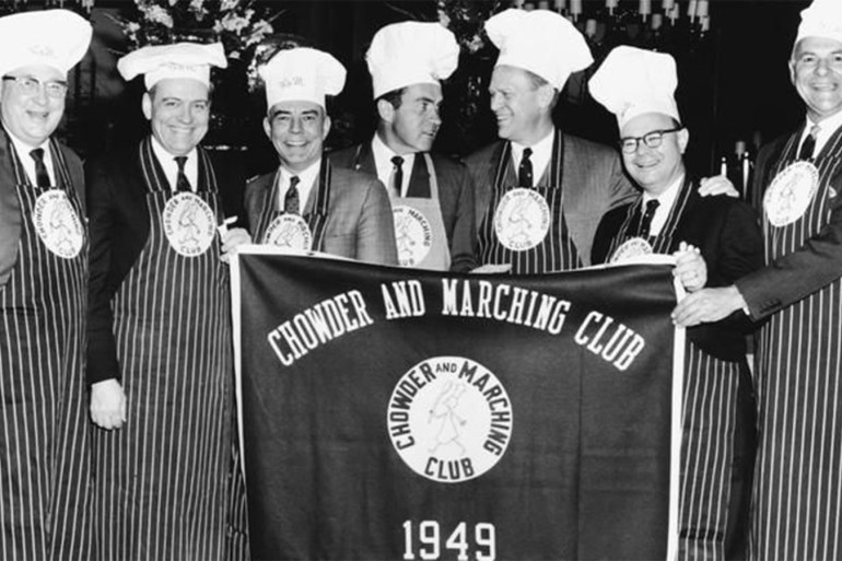 Richard Nixon and Gerald Ford, center, who each went on to become president, face each other in a group photo at a reception of the Chowder and Marching Club. PHOTO: CORBIS/GETTY IMAGES
