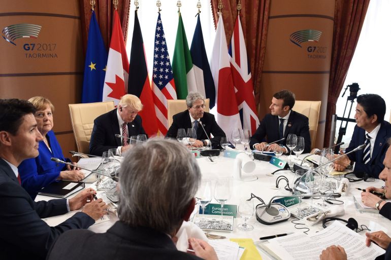 G7 Summit members attend the first working session
