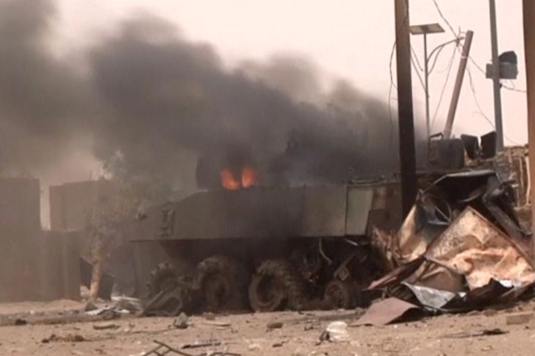 A still image taken from a video shows an armoured personnel carrier on fire after a car bomb attack in Gao, northern Mali July 1, 2018. REUTERS/via Reuters TV