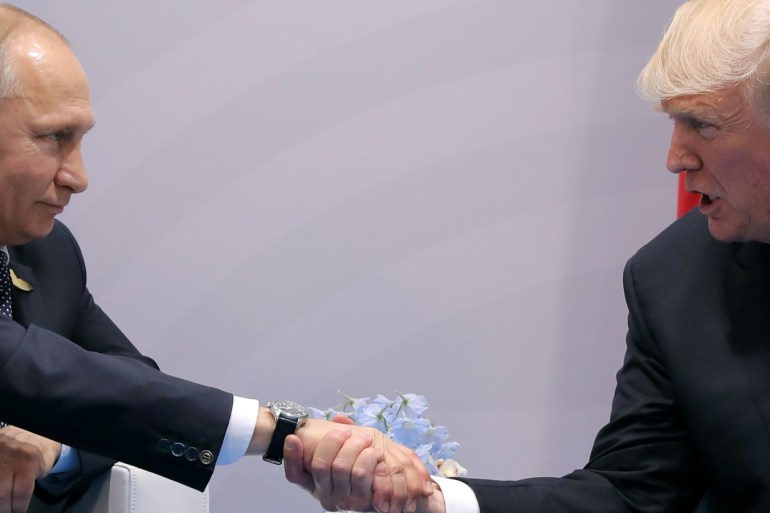 U.S. President Donald Trump shakes hands with Russian President Vladimir Putin during the their bilateral meeting at the G20 summit in Hamburg, Germany July 7, 2017. REUTERS/Carlos Barria TPX IMAGES OF THE DAY