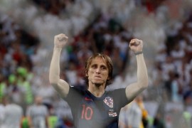 Luka Modric celebrates after the match