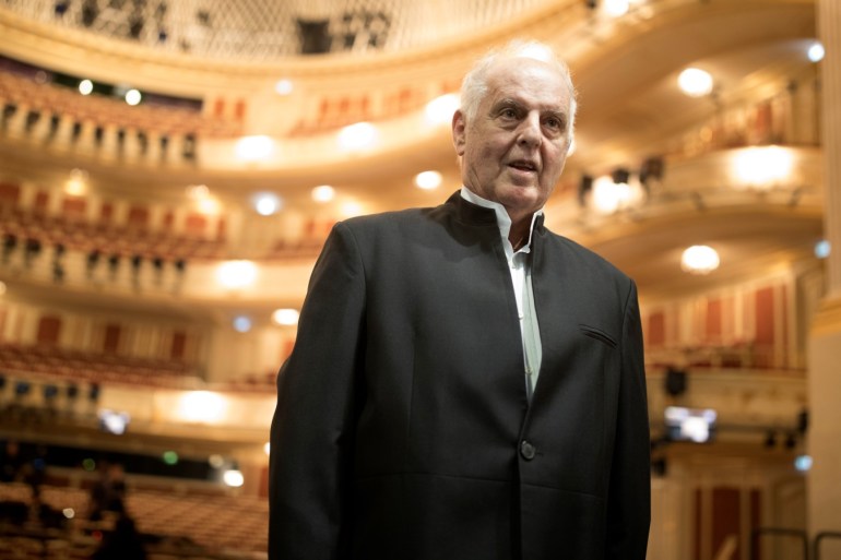 Conductor Daniel Barenboim poses at the renovated Staatsoper opera house before its reopening in Berlin, Germany September 29, 2017. REUTERS/Axel Schmidt