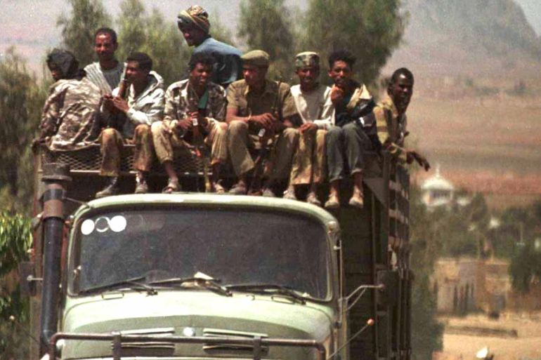 Eritrean troops move to the front at the border town of Zalambesa June 9. Fighting between Eritrea an Ethiopia restarted this morning at this township 170 kilometres north of the capital Asmara.