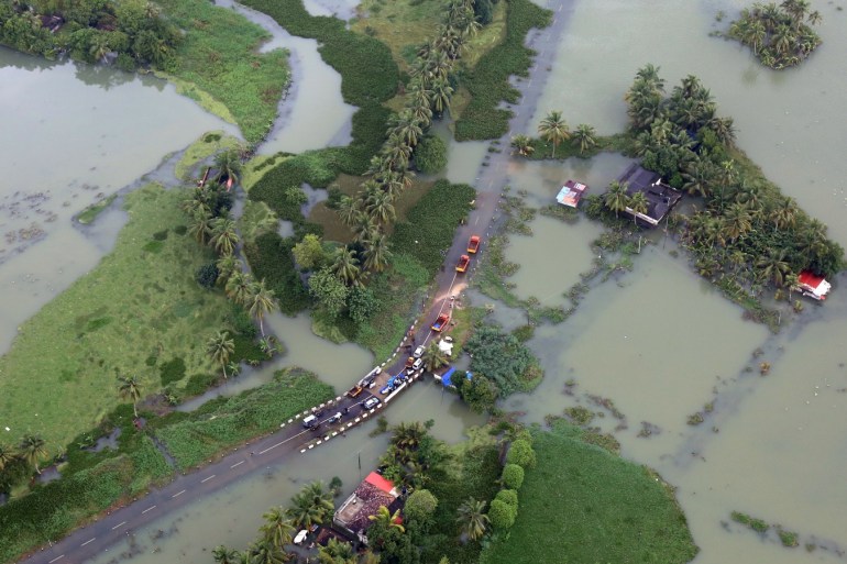 An aerial view shows partially submerged road at a flooded area in the southern state of Kerala, India, August 19, 2018. REUTERS/Sivaram V TPX IMAGES OF THE DAY