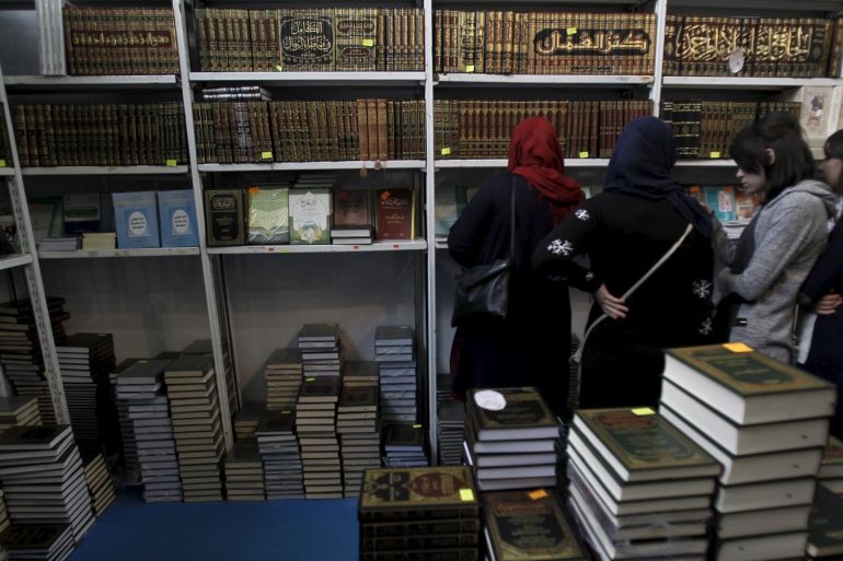 Women look at religious books at the 20th International Book Fair (SILA) in Algiers, Algeria, November 02, 2015. Organisers of an international book fair in Algeria last week confiscated more than 100 books on jihadism and the Arab Spring, highlighting sensitivities over regional turmoil in one of the few Arab countries to remain relatively unscathed. The fair drew tens of thousands of visitors to its stands, scores of foreign publishers and praise from officials for on