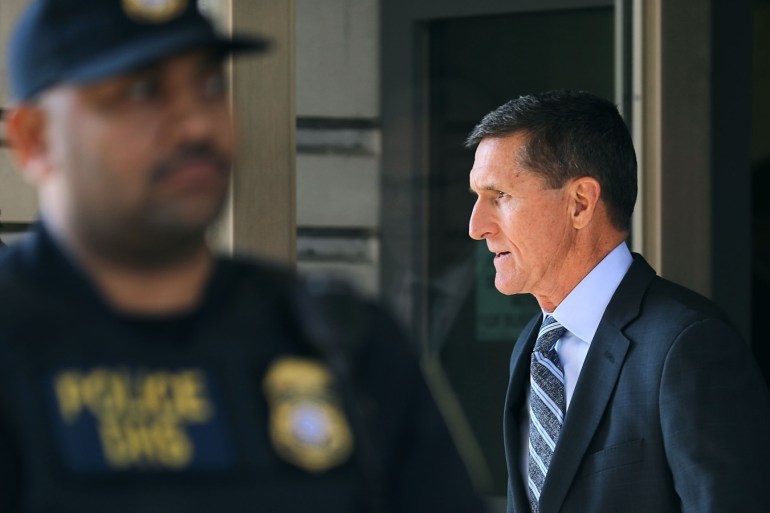WASHINGTON, DC - DECEMBER 01: Michael Flynn, former national security advisor to President Donald Trump, leaves following his plea hearing at the Prettyman Federal Courthouse December 1, 2017 in Washington, DC. Special Counsel Robert Mueller charged Flynn with one count of making a false statement to the FBI. Chip Somodevilla/Getty Images/AFP== FOR NEWSPAPERS, INTERNET, TELCOS & TELEVISION USE ONLY ==