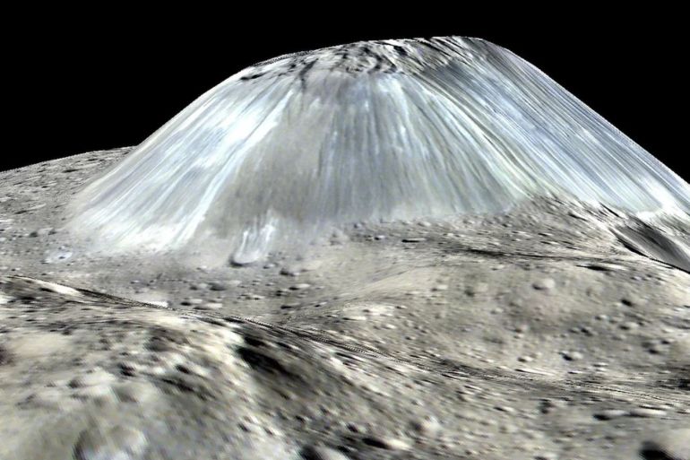 A simulated perspective of Ahuna Mons, based on images taken from Dawn in 2016, at an altitude of 240 miles. NASA/JPL-CALTECH/UCLA/MPS/DLR/IDA/PSI