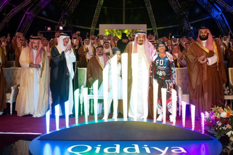Saudi Arabia King Salman bin Abdulaziz Al Saud (C) and Crown Prince Mohammed bin Salman (R) attend Qiddiya