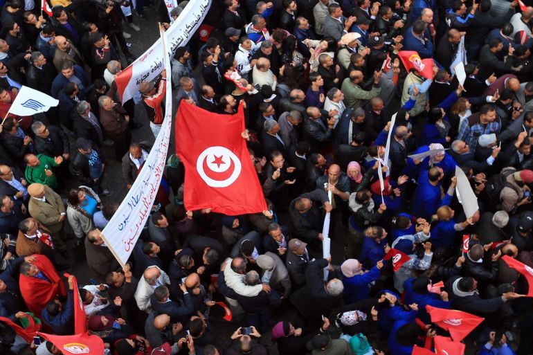 UGTT insists on strike in Tunis- - TUNIS, TUNISIA - NOVEMBER 17 : Workers and civil servants gather for Secretary-General of Tunisian General Labour Union (UGTT) Noureddine Taboubi's speech at the union building in Tunis, Tunisia on November 17, 2018. Taboubi announced the strike at all public institutions, which is scheduled to take place on November 22, will not be canceled.