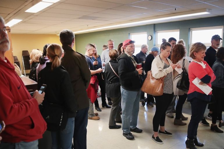 KIRKWOOD, MO - NOVEMBER 06: Voters wait in line to vote at a polling place on November 6, 2018 in Kirkwood, Missouri. Voters across the country are casting ballots in a midterm election that couuld change the ballance of both the U.S. House and Senate. Scott Olson/Getty Images/AFP.== FOR NEWSPAPERS, INTERNET, TELCOS & TELEVISION USE ONLY ==