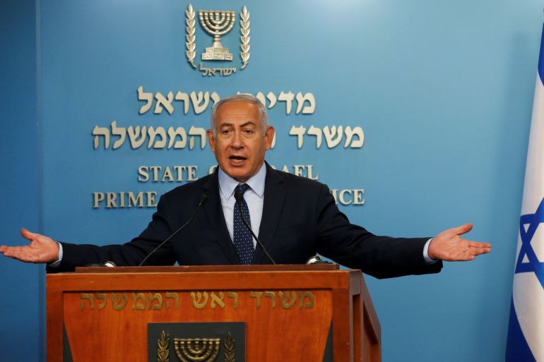 Israeli Prime Minister Benjamin Netanyahu gestures during a news conference, with his Finance Minister Moshe Kahlon (not pictured), announcing the appointment of the new Bank of Israel Governor, in Jerusalem October 9, 2018. REUTERS/Ronen Zvulun
