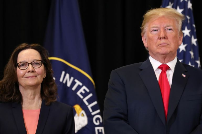 U.S. President Donald Trump stands with the new CIA Director Gina Haspel during her swearing-in ceremony at the headquarters of the Central Intelligence Agency in Langley, Virginia, U.S. May 21, 2018. REUTERS/Kevin Lamarque