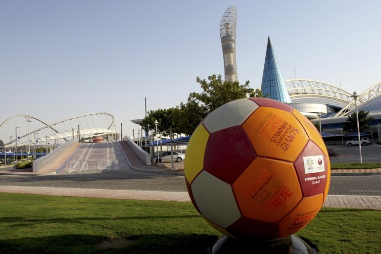A giant soccer ball is seen in front of the main entrance of the Aspire Academy of Sports Excellence and Khalifa Stadium (Aspire zone) in Doha September 11, 2010. FIFA officials will visit Aspire Academy of Sports Excellence and Khalifa Stadium next week, as part of a four-day tour of various sites related to Qatar's bid to host the 2022 World Cup. REUTERS/Fadi Al-Assaad (QATAR - Tags: SPORT SOCCER)