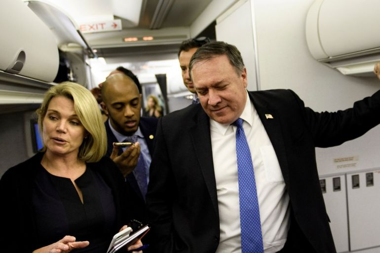 Spokesperson Heather Nauert (L) speaks as U.S. Secretary of State Mike Pompeo dialogues with reporters in his plane while flying from Panama to Mexico, October 18, 2018. Brendan Smialowski/Pool via REUTERS