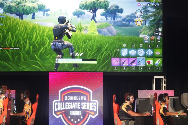ATLANTA, GA - NOVEMBER 16: Students from Louisiana State University and The University of Washington compete in the online game Fortnite during DreamHack Atlanta 2018 at the Georgia World Congress Center on November 16, 2018 in Atlanta, Georgia. Chris Thelen/Getty Images/AFP== FOR NEWSPAPERS, INTERNET, TELCOS & TELEVISION USE ONLY ==