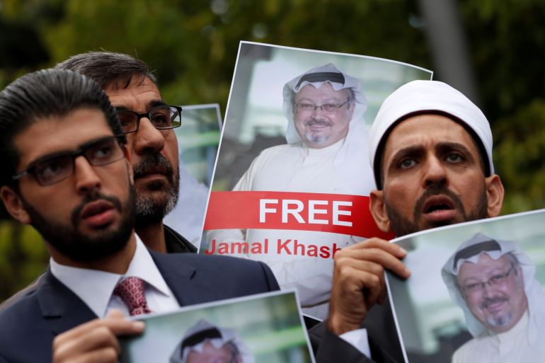 Human rights activists and friends of Saudi journalist Jamal Khashoggi hold his pictures during a protest outside the Saudi Consulate in Istanbul, Turkey October 8, 2018. REUTERS/Murad Sezer