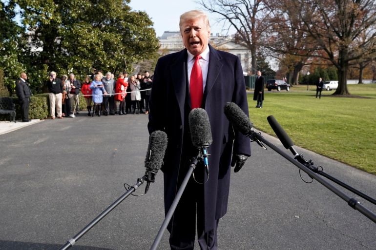 U.S. President Donald Trump talks to the media on the South Lawn of the White House in Washington before his departure for the annual Army-Navy college football game in Philadelphia, U.S., December 8, 2018. REUTERS/Yuri Gripas