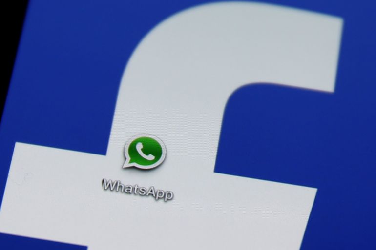 A Whatsapp icon is seen on a Samsung Galaxy S4 phone screen with a Facebook logo in the central Bosnian town of Zenica, February 20, 2014. Facebook Inc will buy fast-growing mobile-messaging startup WhatsApp for $19 billion in cash and stock in a landmark deal that places the world's largest social network closer to the heart of mobile communications and may bring younger users into the fold. REUTERS/Dado Ruvic (BOSNIA AND HERZEGOVINA - Tags: BUSINESS)