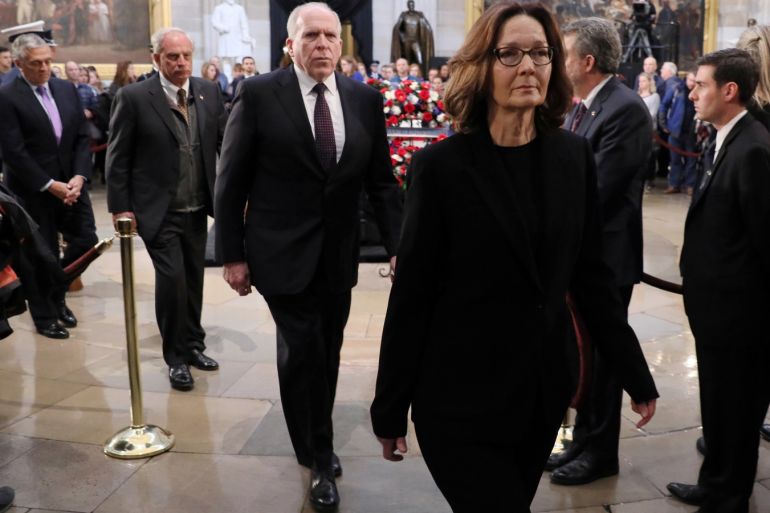 U.S. Central Intelligence Agency (CIA) Director Gina Haspel (R) leads former CIA directors including George Tenet, Porter Goss and John Brennan as they depart after paying their respects to former U.S. President George H. W. Bush as his body lies in state inside the Rotunda of the U.S. Capitol in Washington, U.S., December 4, 2018. REUTERS/Jonathan Ernst