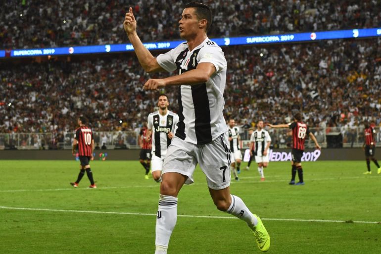 JEDDAH, SAUDI ARABIA - JANUARY 16: Cristiano Ronaldo of Juventus celebrates after scoring his sides first goal during the Italian Supercup match between Juventus and AC Milan at King Abdullah Sports City on January 16, 2019 in Jeddah, Saudi Arabia. (Photo by Claudio Villa/Getty Images for Lega Serie A)