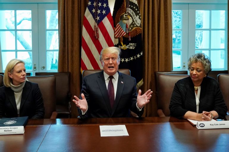 Department of Homeland Security (DHS) Secretary Kirstjen Nielsen (L) listens as U.S. President Donald Trump leads a discussion on immigration proposals with conservative leaders in the Cabinet Room of the White House in Washington, U.S., January 23, 2019. REUTERS/Kevin Lamarque