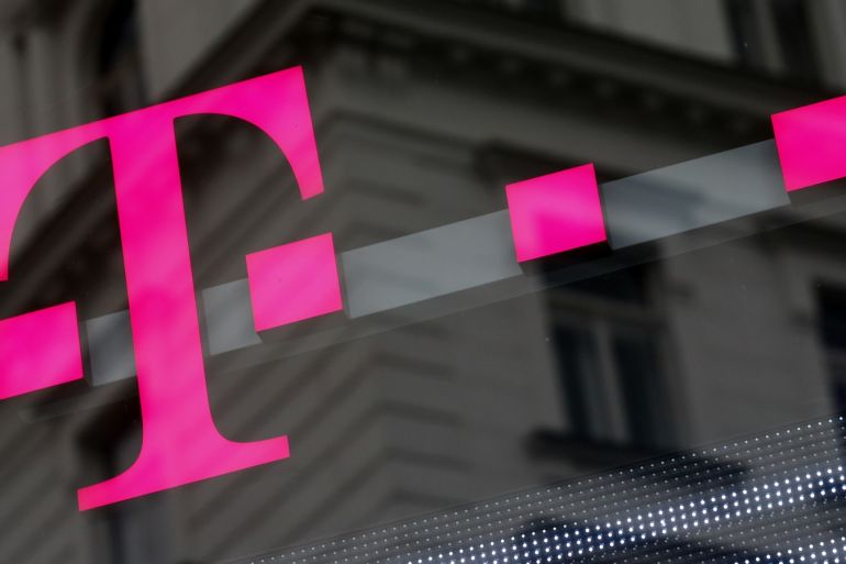 The logo of T-Mobile Austria is seen outside of one of its shops in Vienna, Austria, February 25, 2016. REUTERS/Leonhard Foeger