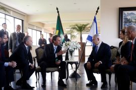 Brazil's President-elect Jair Bolsonaro talks with Israeli Prime Minister Benjamin Netanyahu during a meeting in Rio de Janeiro, Brazil December 28, 2018. Fernando Frazao/Courtesy of Agencia Brasil/Handout via REUTERS ATTENTION EDITORS - THIS IMAGE HAS BEEN SUPPLIED BY A THIRD PARTY.