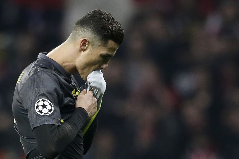 MADRID, SPAIN - FEBRUARY 20: Cristiano Ronaldo of Juventus walks off the pitch dejected after defeat in the UEFA Champions League Round of 16 First Leg match between Club Atletico de Madrid and Juventus at Estadio Wanda Metropolitano on February 20, 2019 in Madrid, Spain. (Photo by Gonzalo Arroyo Moreno/Getty Images)