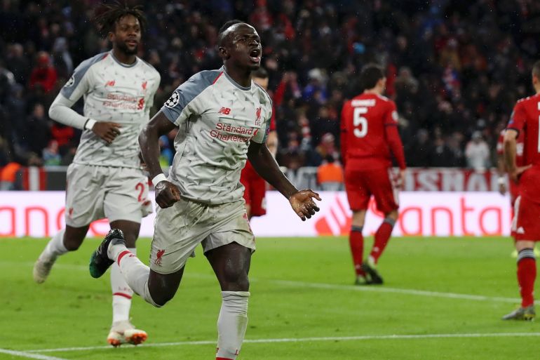 MUNICH, GERMANY - MARCH 13: Sadio Mane of Liverpool celebrates as he scores his team's third goal during the UEFA Champions League Round of 16 Second Leg match between FC Bayern Muenchen and Liverpool at Allianz Arena on March 13, 2019 in Munich, Bavaria. (Photo by Alex Grimm/Bongarts/Getty Images)