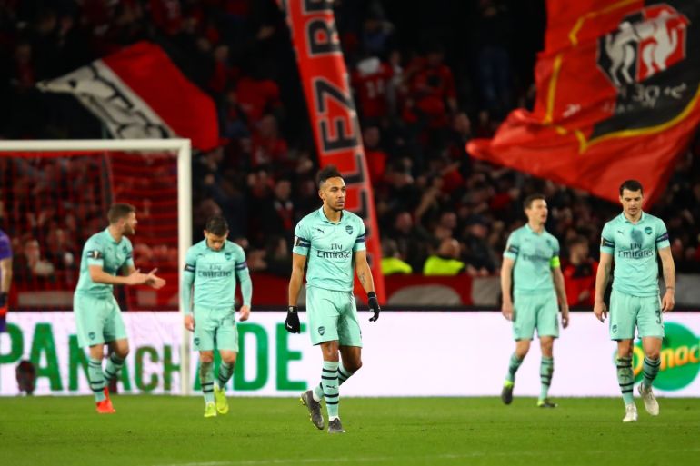 RENNES, FRANCE - MARCH 07: Pierre-Emerick Aubameyang of Arsenal and his team-mates show their dejection after conceding a second goal during the UEFA Europa League Round of 16 First Leg match between Stade Rennais and Arsenal at Roazhon Park on March 07, 2019 in Rennes, France. (Photo by Julian Finney/Getty Images)