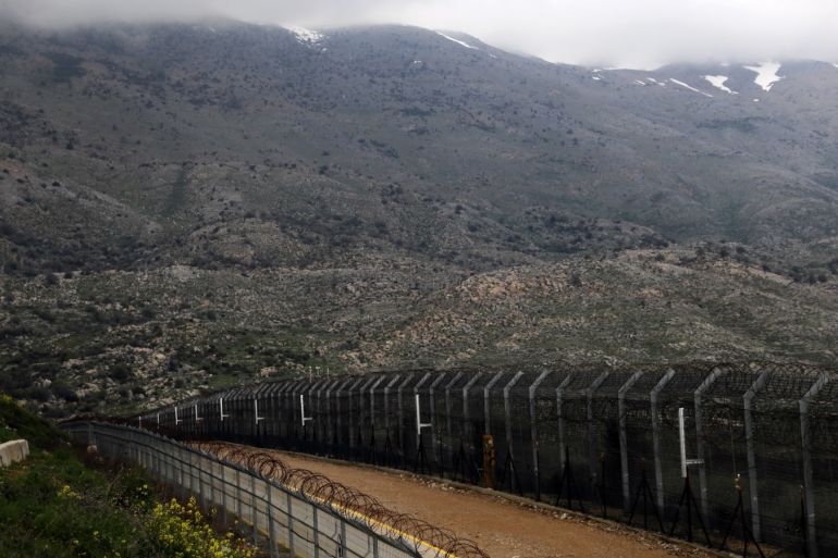 Fences are seen on the ceasefire line between Israel and Syria in the Israeli-occupied Golan Heights March 25, 2019. REUTERS/Ammar Awad