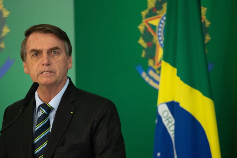 BRASILIA, BRAZIL - FEBRUARY 28: Brazilian President Jair Bolsonaro speaks with the press after meeting with venezuelan opposition leader and self-declared iterim president Juan Guaido at Palace Itamaraty on February 28, 2019 in Brasília, Brazil. (Photo by Andressa Anholete/Getty Images)