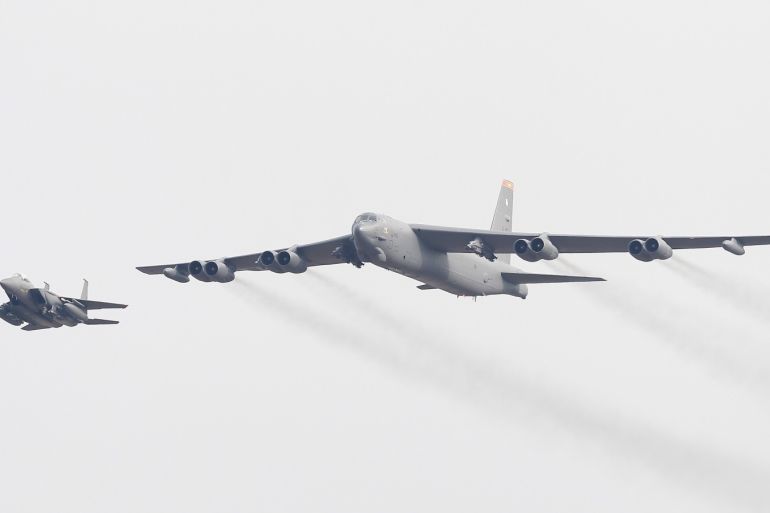PYEONGTAEK, SOUTH KOREA - JANUARY 10: A U.S. Air Force B-52 bomber flies over Osan Air Base on January 10, 2016 in Pyeongtaek, South Korea. South Korea and the United States have deployed the B-52 Stratofortress, a long-range strategic bomber over the Korean Peninsula three days after North Korea said it has tested a hydrogen bomb. (Photo by Chung Sung-Jun/Getty Images)