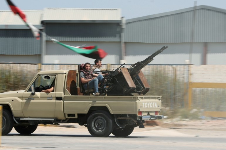 Members of the Libyan internationally recognised government forces are seen in Al-Swani area in Tripoli, Libya April 18, 2019. REUTERS/Ahmed Jadallah