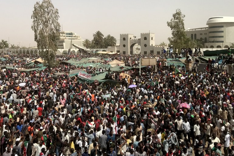 Demonstrations in Sudan- - KHARTOUM, SUDAN - APRIL 11 : Thousands of Sudanese demonstrators continue demonstrations outside the military headquarters in Khartoum, Sudan on April 11, 2019. The Sudanese military on Thursday afternoon announced the “removal” of President Omar al-Bashir, who had ruled Sudan since 1989, and the imposition of a two-year “transitional phase”. Sudanese opposition groups' statement also called on protesters to remain in the streets “until power