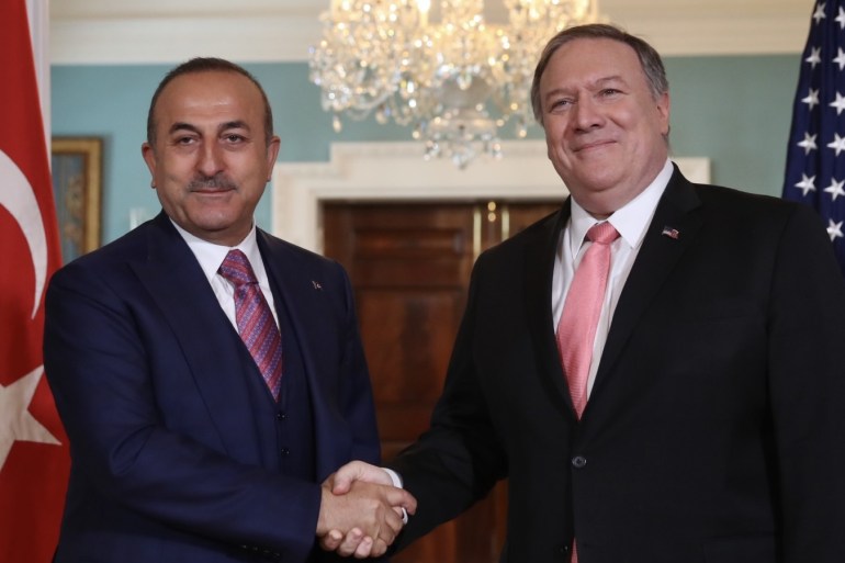 Turkish FM Cavusoglu meets U.S. Secretary of State Pompeo- - WASHINGTON, USA - APRIL 03: Minister of Foreign Affairs of Turkey, Mevlut Cavusoglu (L) shakes hands with U.S. Secretary of State, Mike Pompeo (R) as they pose for a photo during their meeting in Washington, United States on April 03, 2019.