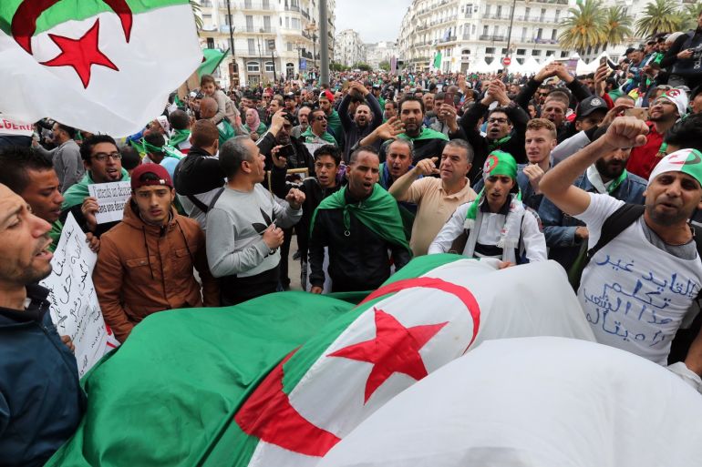 epa07529168 Algerians shout slogans during a demonstration for the departure of the Algerian regime in Algiers, Algeria, 26 April 2019. The Algerian protests that began in early February 2019, after the former president announced his candidacy for a fifth presidential term, continue to call for radical change of the system. EPA-EFE/MOHAMED MESSARA