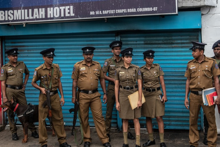 COLOMBO, SRI LANKA - APRIL 26: A soldier waits with police officers as people leave after attending Friday prayers at Dawatagaha Jumma Masjid on April 26, 2019 in Colombo, Sri Lanka. The Sri Lankan Health Ministry revised the death toll from the deadly terror attacks on Easter Sunday to 253 after coordinated attacks on three churches and three luxury hotels in the Colombo area and eastern city of Batticaloa, injuring hundreds. Based on reports, six foreign police agenci
