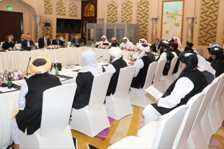 Undated handout picture of U.S., Taliban and Qatar officials during a meeting for peace talks in Doha, Qatar. Qatari Foreign Ministry/Handout via REUTERS ATTENTION EDITORS - THIS PICTURE WAS PROVIDED BY A THIRD PARTY.