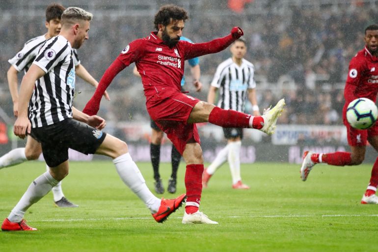NEWCASTLE UPON TYNE, ENGLAND - MAY 04: Mohamed Salah of Liverpool shoots during the Premier League match between Newcastle United and Liverpool FC at St. James Park on May 04, 2019 in Newcastle upon Tyne, United Kingdom. (Photo by Clive Brunskill/Getty Images)