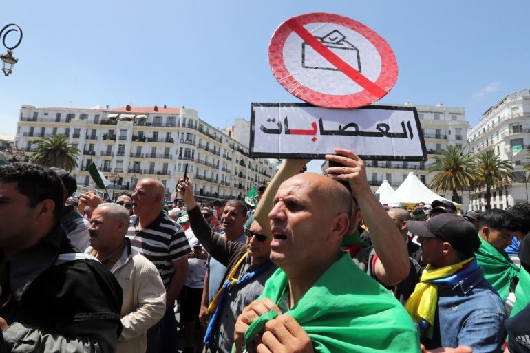 epa07578270 Algerians protest during a demonstration for the departure of the Algerian regime in Algiers, Algeria, 17 May 2019. Media reports state that the protesters are demanding the departure of the Algerian government. EPA-EFE/MOHAMED MESSARA
